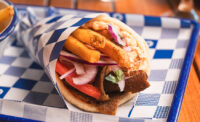 The Gyro Project offers a modern, street food-style menu featuring gyro platters, souvlaki, lamb chops, moussaka, house-stacked meats and imported olive oils.