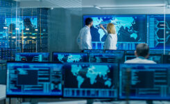 Professionals in system monitoring room