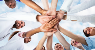 Diverse Medical Team Staff Hands Stack Outdoors