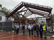 Project partners and community members including Alex McDonald, Millburn Township administrator; Mark Hoebee, producing artistic director, PMP; Dean Bruno, The AMA Group; Merilee Meacock, architect, and Don Kim, senior associate, KSS Architects; Mike Stotts, executive director, PMP; John Brucker, owners' representative; Doug Phelps and Jeff Rainforth, Phelps Construction Group; Rick Davis, board member/facility committee, PMP; and Mitesh Suthar, Phelps Construction Group, celebrate the topping-off of the F.M. Kirby Carriage House Restaurant Sept. 25, 2025 in Millburn. - PROVIDED BY KSS ARCHITECTS/PAPER MILL PLAYHOUSE