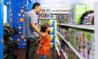 Consumers shop at the Toys R Us flagship store.