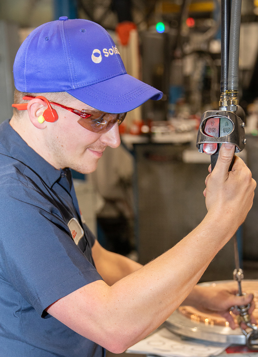 A Solstice advanced materials machinist goes through the precise finishing process on the sputtering target.