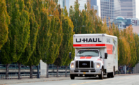 A U-Haul truck drives away from an urban area. U-Haul released its latest Growth Index Jan. 5, 2026. PROVIDED BY U-HAUL