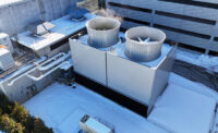Two of the ON3 power plant's new fiberglass cooling towers.