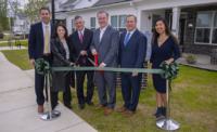 From left: The Michaels Organization Vice President Nick Cangelosi, Voorhees Township Committeewoman Michelle Nocito, Assembly Majority Leader Louis Greenwald, Voorhees Township Mayor Michael Mignogna, Camden County Commissioner Director Louis Cappelli Jr., AND NJHMFA Chief of Multifamily Programs Debra Urban cut the ribbon at Victory Commons in Voorhees Township April 30, 2026. PROVIDED BY CAMDEN COUNTY
