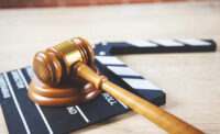 Gavel and film clapperboard