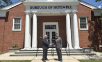 New Jersey American Water President Mark McDonough and Hopewell Borough Mayor Ryan Kennedy