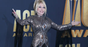 Dolly Parton arrives at the 2022 Academy of Country Music Awards at Allegient Stadium on March 7, 2022, in Las Vegas.