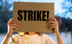 Activist holding a strike sign